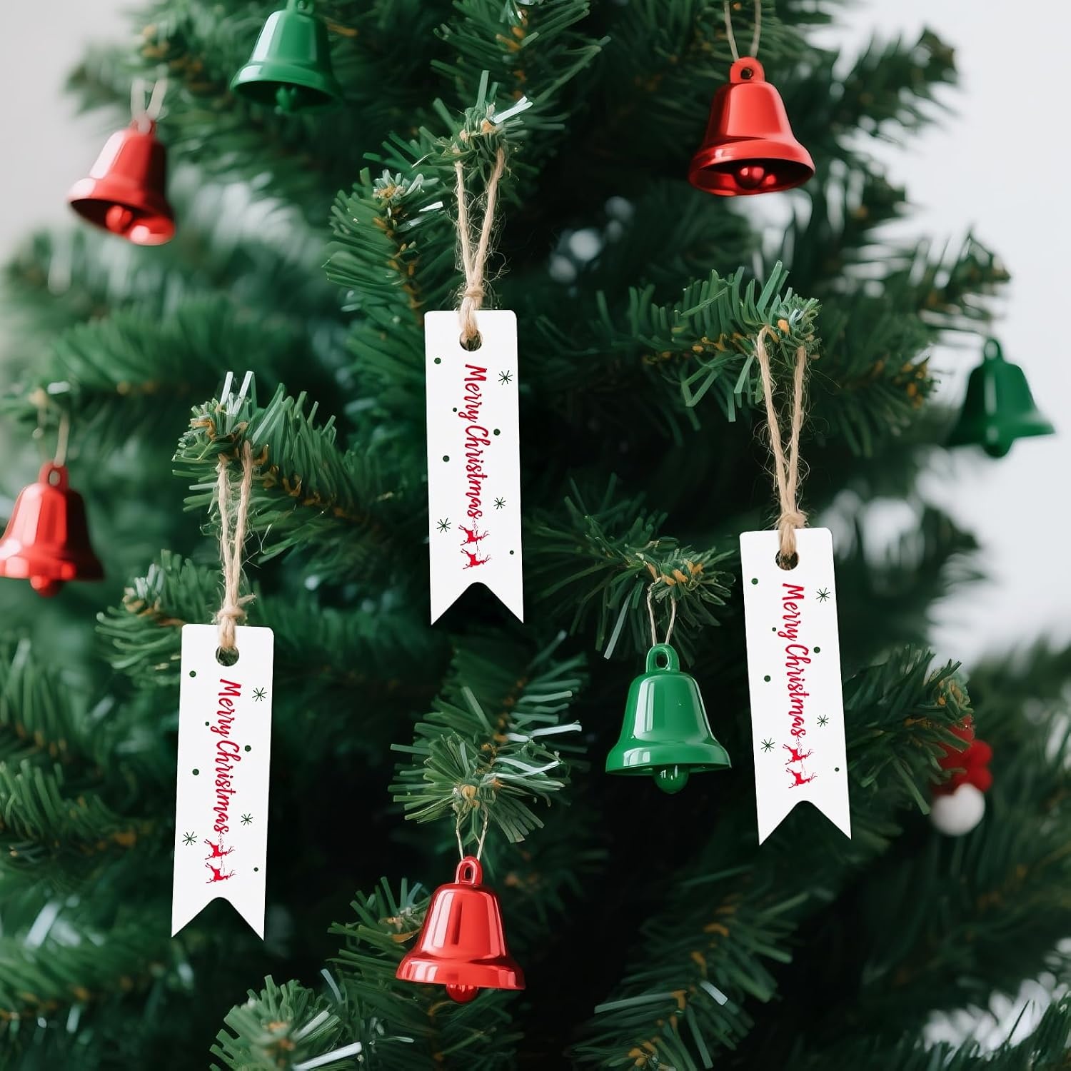 image:imageG2PLUS Small Merry Christmas Tags  100Pcs Deer Kraft Paper Gift Tags with String for Gift Wrapping Goodies Bags Christmas Holiday Party Favors28x08100 Pcs White Mini Merry Christmas Elks Tags